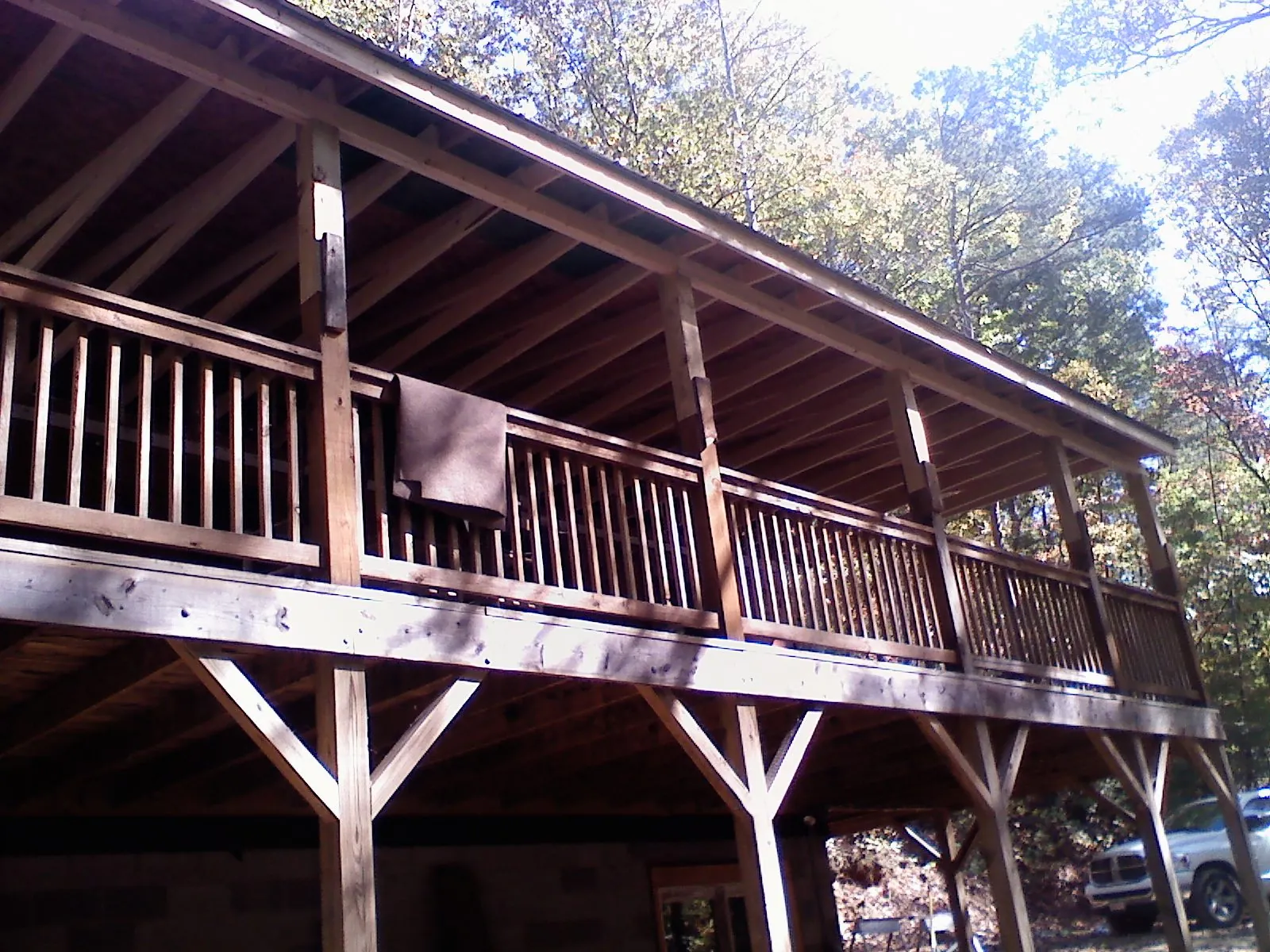 Timber framing under a new elevated porch and deck — Roof Leak Repair in North Franklin by Roofing Brothers